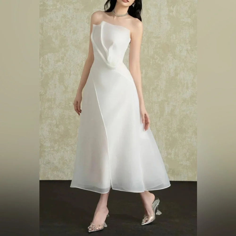 Elegant Strapless White Midi Dress with Draped Bodice - Picture 2 of 7
